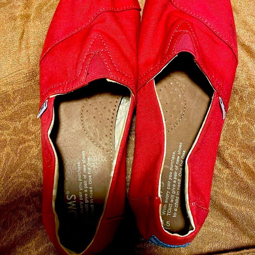 Tom’s great condition. Hardly worn very clean.
